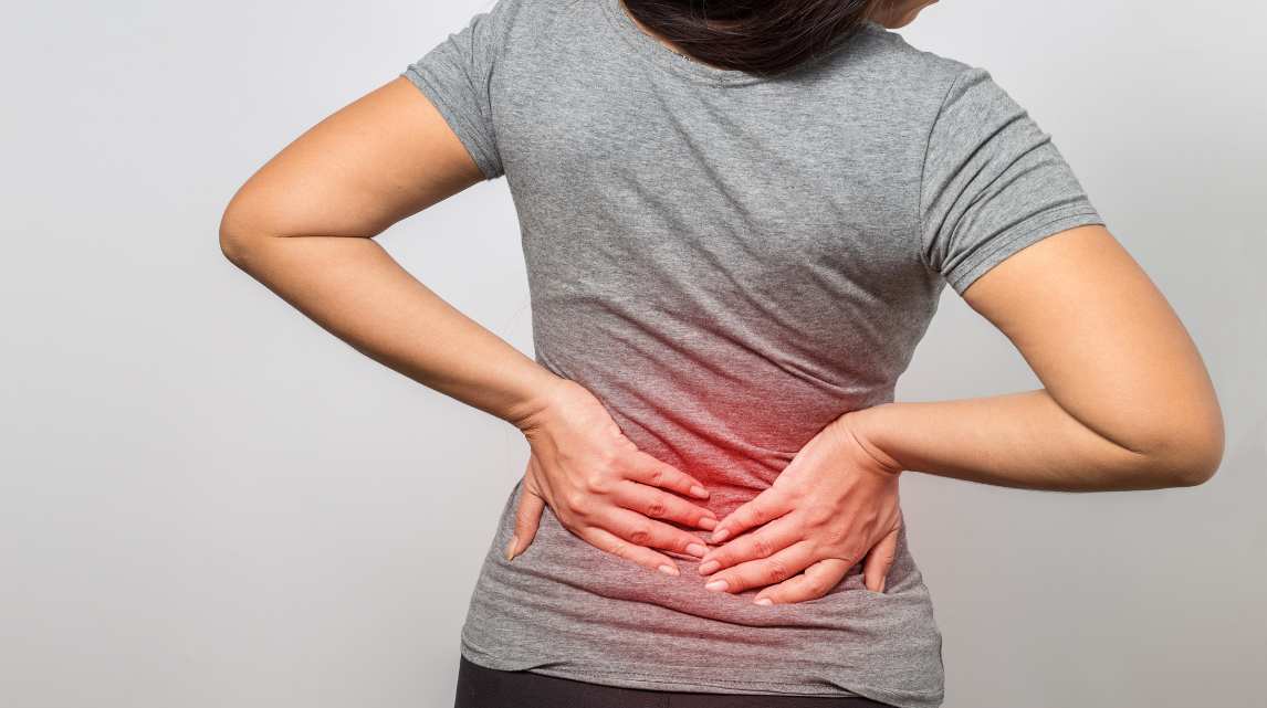 dolor de espalda, dolor lumbar o lumbalgia por estreñimiento